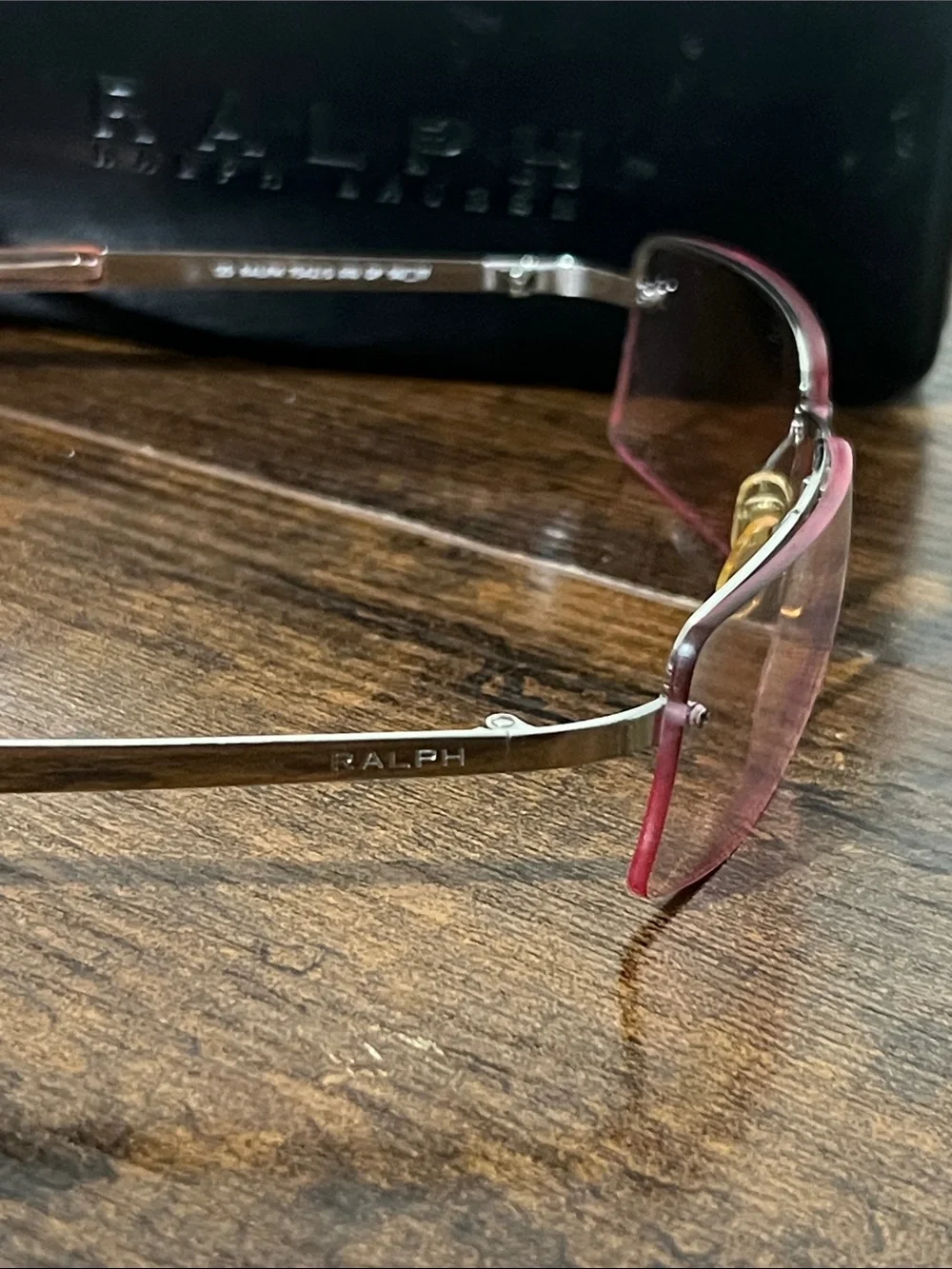 Ralph Lauren women’s Brown-Tinted Rimless Sunglasses pink